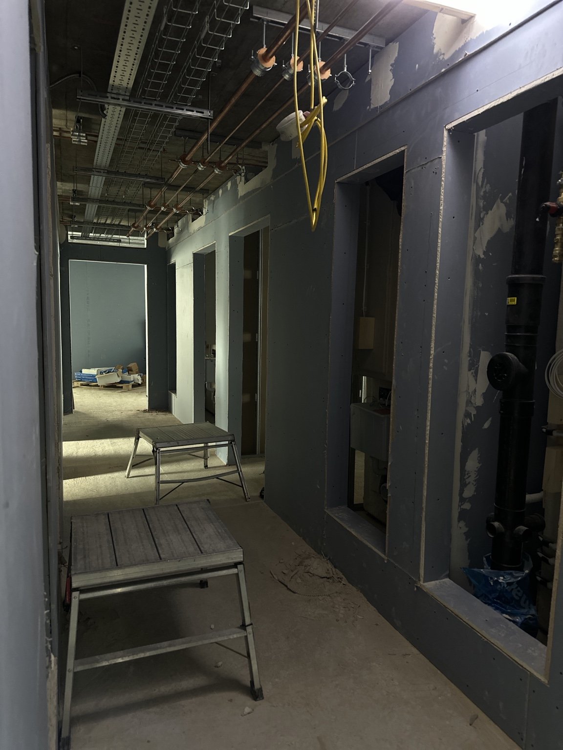 Boarded partition walls and doorway openings during interior works