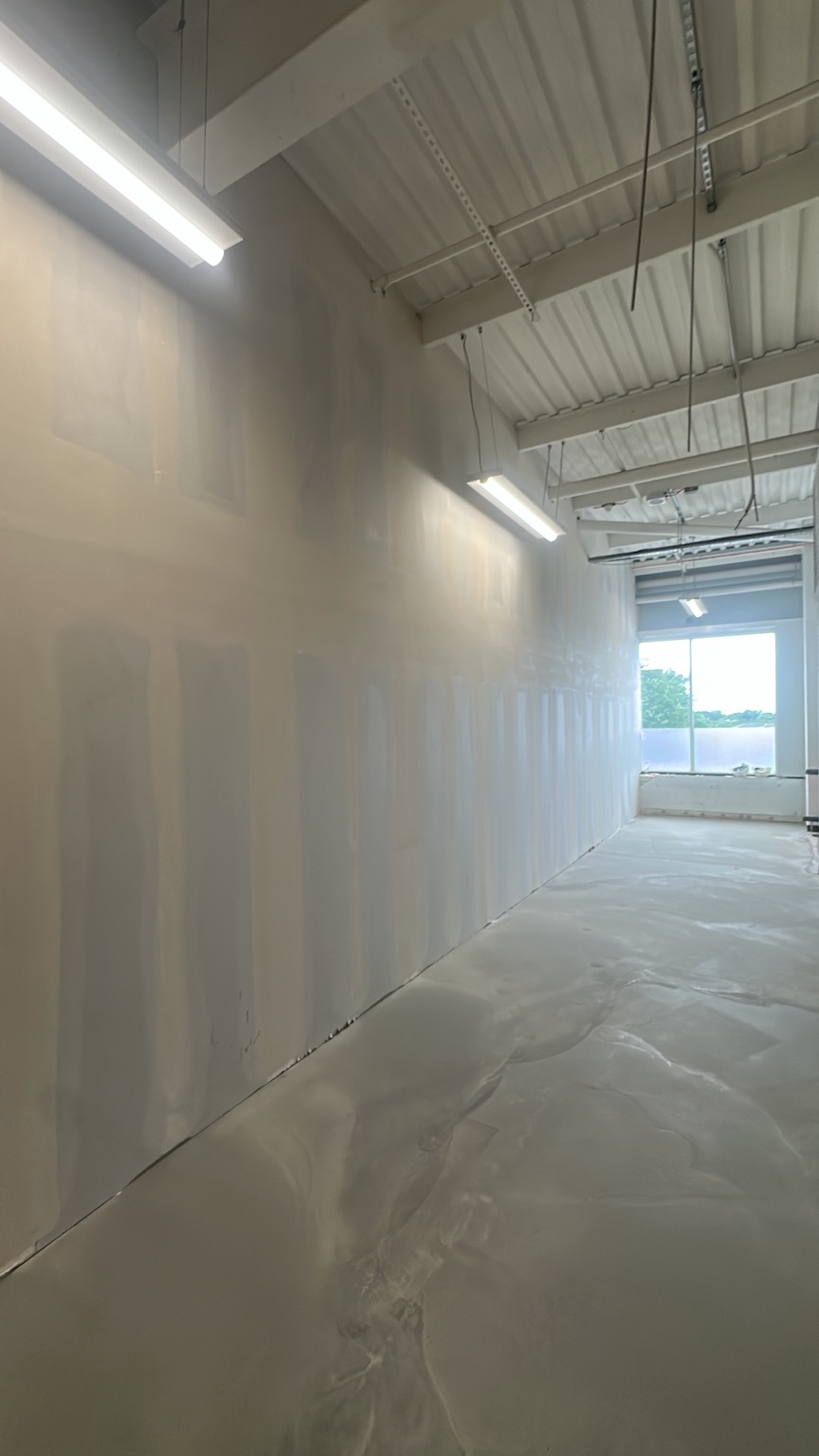 Internal wall joints prepared along a corridor